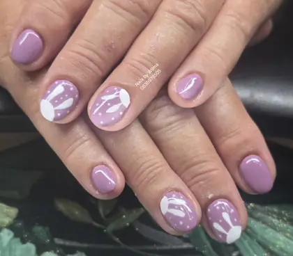 Lilac nails with white heart details