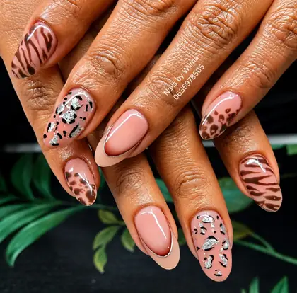 Peach nails with animal-print details