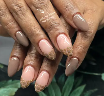 Peach nails with gold accent details
