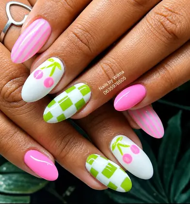 Pink and green nails with fruit-inspired details