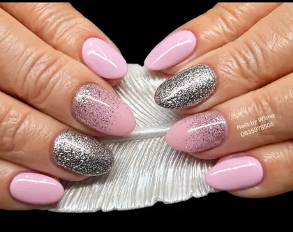 Pink nails with silver glitter accents