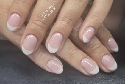 Soft pink nails with white French-style tips