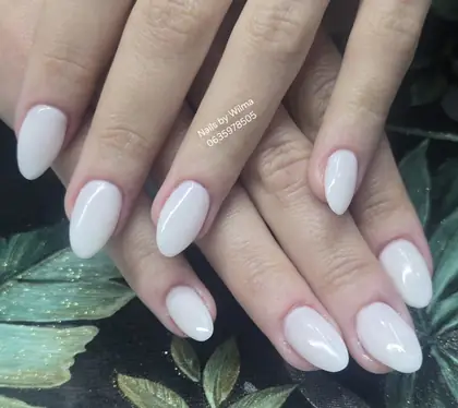 Soft white almond-shaped nails
