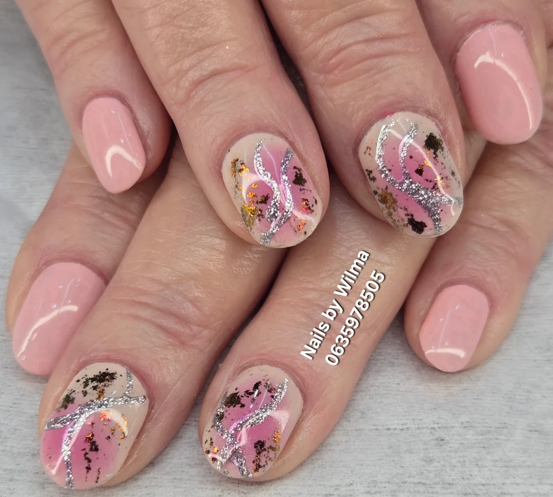 Simple white and gold glitter gradient on oval shaped nails