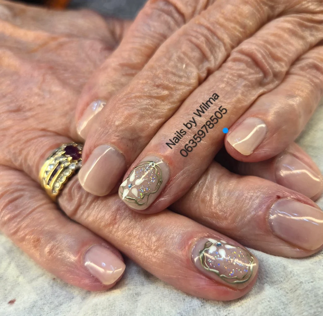 Natural nude gel polish with a delicate chrome effect on the tips
