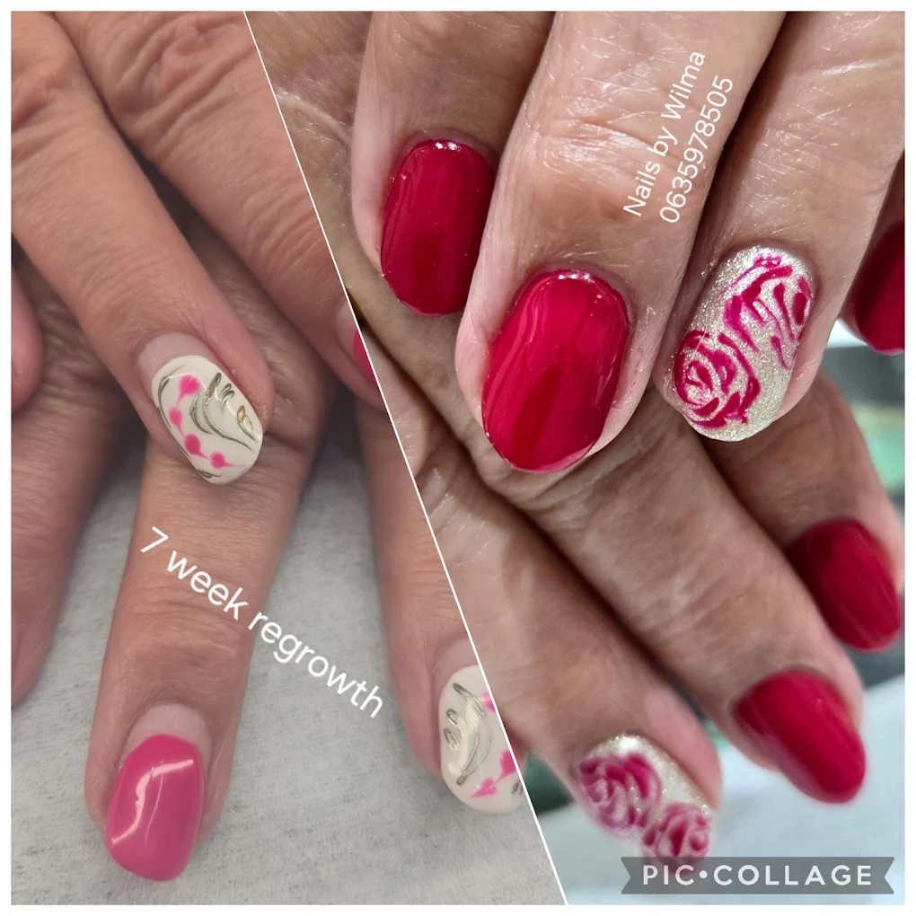 Detailed floral nail art with small red and white flowers