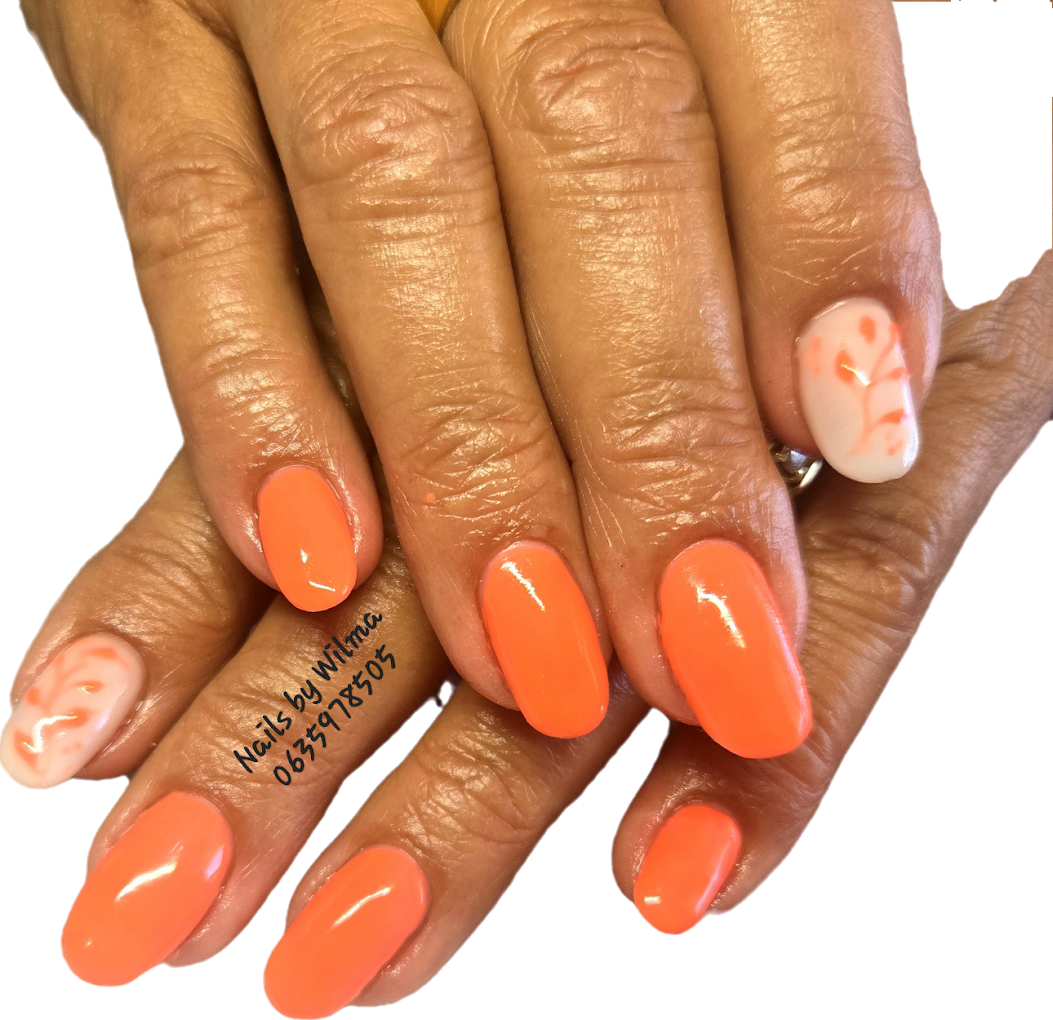 Soft pink ombre nails with a subtle shimmer finish, long coffin shape